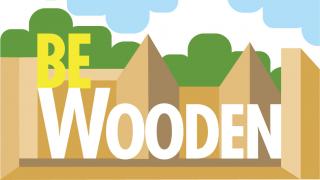 logo del progetto con scritta BE WoodEN e sullo sfondo edifici in legno, alberi e nuvole